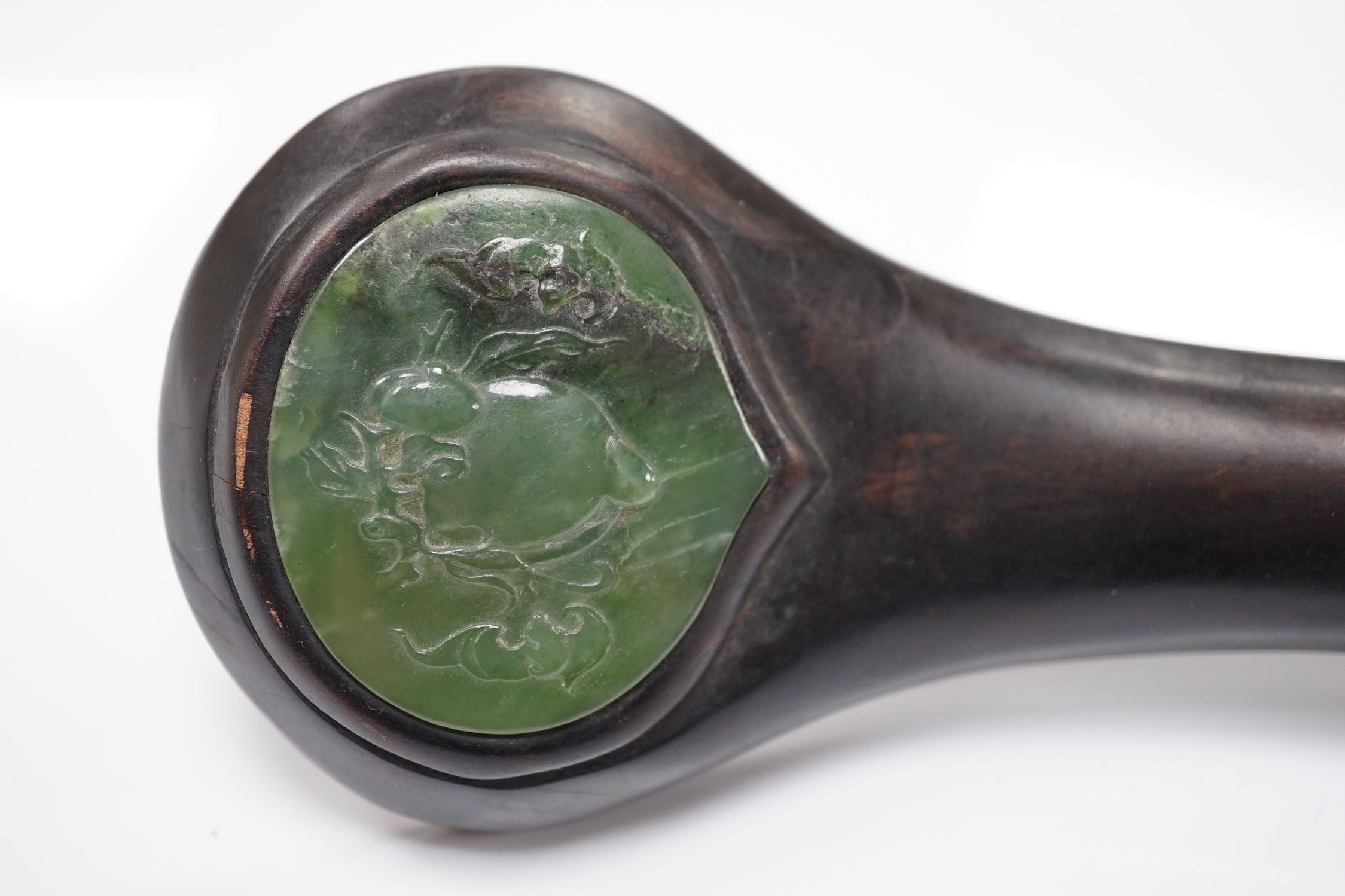 A Chinese spinach green jade inset hardwood ruyi sceptre, 51cm